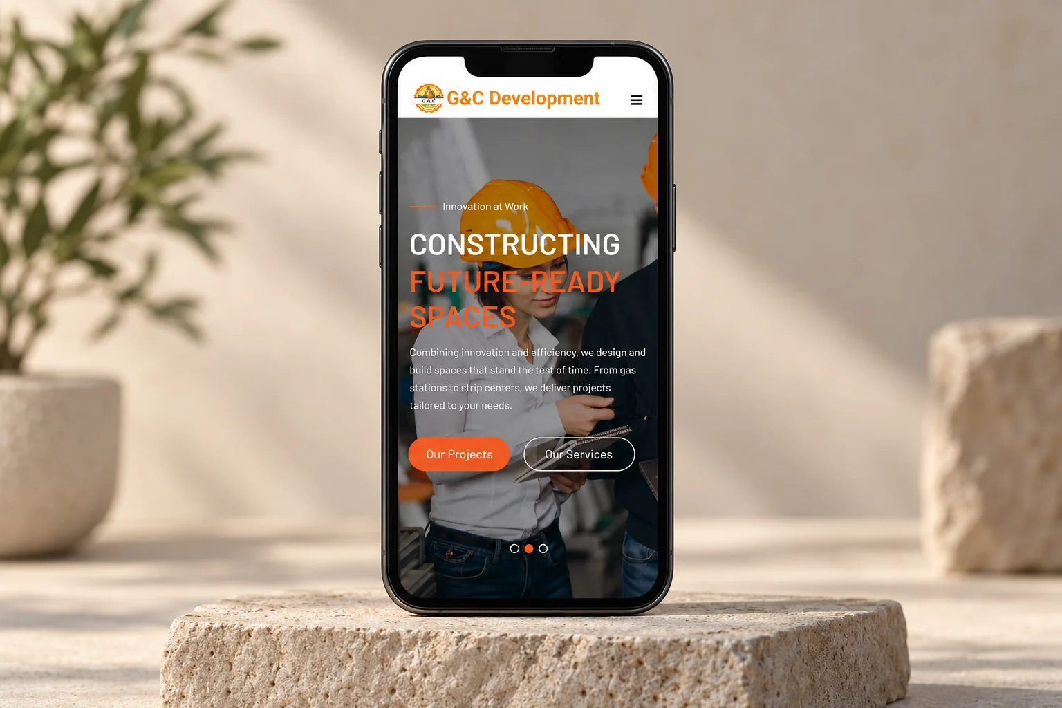 G&C Development mobile homepage on a smartphone.