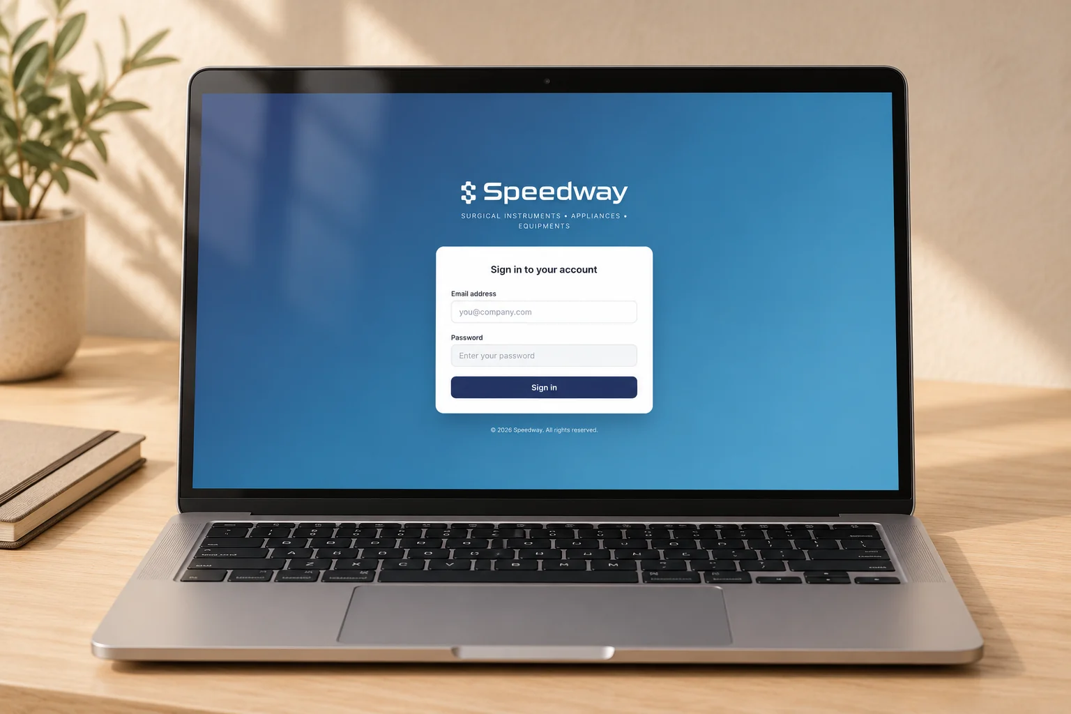 Speedway ERP public sign-in page on a laptop.