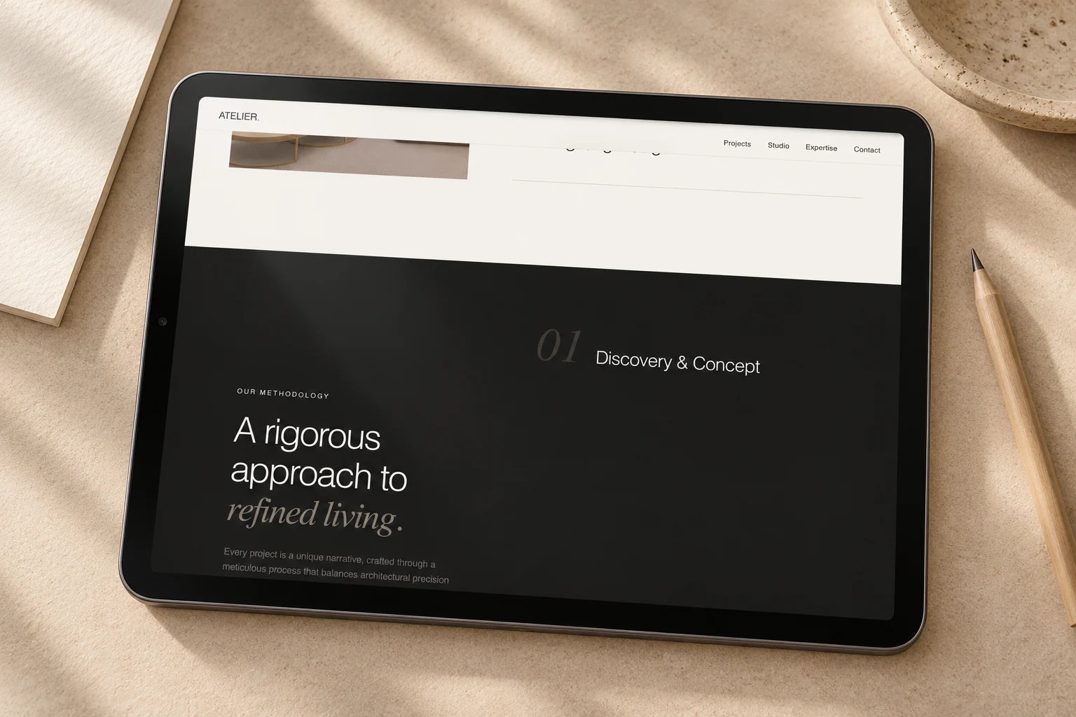 Studio Atelier concept methodology on a tablet.