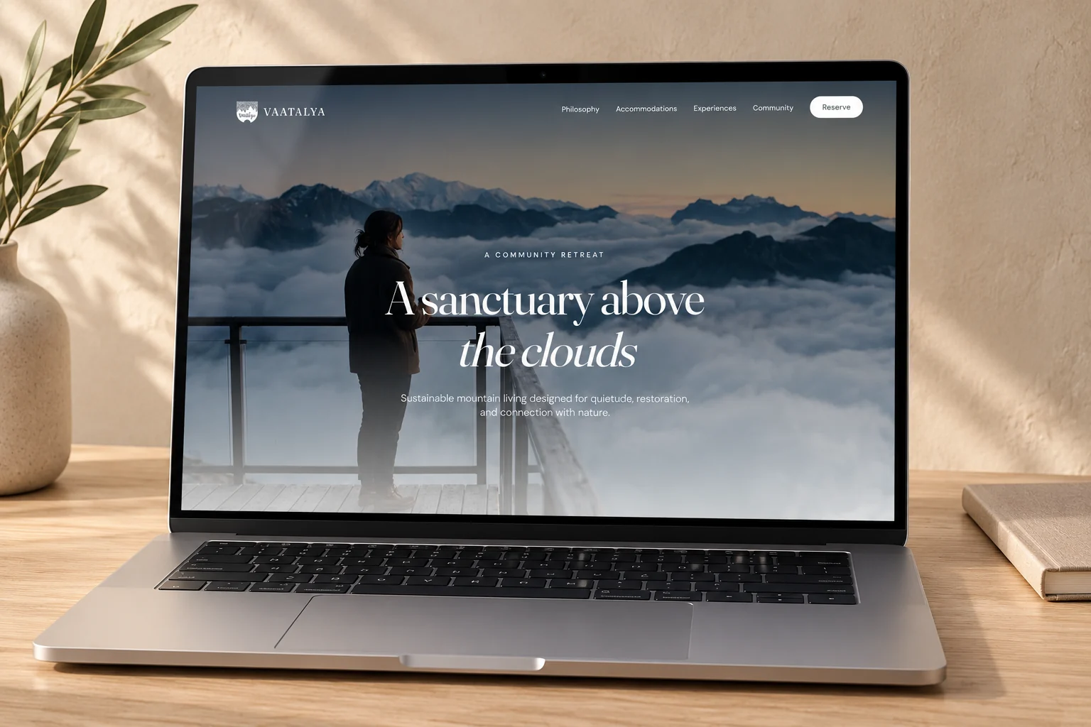 Vaatalya mountain retreat homepage on a laptop.